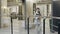 Woman in suit with folder walking in tile showroom