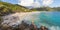 Woman on summer vacations on tropical beach of Mahe Island, Seychelles.