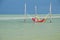 A Woman with sun hat and bikini relaxing on hammock in Holbox