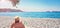 Woman sunbathes tanning beach Zanjic Adriatik sea Montenegro peninsula Lustica