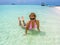 Woman sunbathing in Maldives lagoon