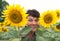 Woman in sunflowers