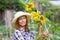 Woman with sunflowers