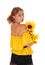 Woman with sunflowers looking over shoulder.