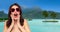 Woman with sunglasses over bora bora beach