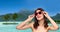 Woman with sunglasses over bora bora beach