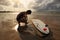 woman surfer ready to surf on a beach