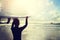 Woman surfer with surfboard ready to surf on a beach