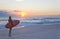 Woman Surfer & Surfboard At Sunset Sunrise Beach