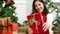 Woman surprise got present gift box on christmas eve.