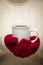 Woman in Sweater with Red Mittens Holding Cup of Coffee