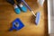 Woman sweeping floor with a broom