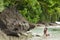 Woman swimming on a beautiful lush