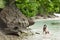 Woman swimming on a beautiful lush