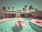 Woman swimming on float in a pool. 3d rendering