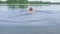 Woman swimming in the lake