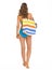 Woman in swimsuit with beach bag going straight