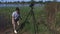 Woman take photos near lake