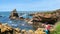 Woman take picture from Rock of the Virgin, Biarritz city, Franc