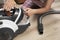 woman takes apart modern cyclone bagless vacuum cleaner. housekeeping, cleaning