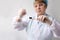 Woman takes a sample from a toothbrush for genetic research in the laboratory, concept of DNA analysis, contamination with