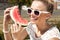 Woman takes watermelon. Concept of healthy and dieting food