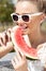 Woman takes watermelon. Concept of healthy and dieting food