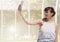 Woman taking casual selfie photo in front of greenhouse