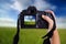 Woman taking a landscape photo