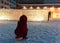 Woman taking photo of girl at Iced wall in Rovaniemi