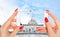 Woman taking a picture of Basilique Du Sacre Coeur, Paris