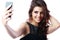woman taking self picture with smartphone