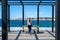 A woman talking on the phone, pier, Nikiti, Greece