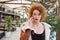 Woman talking on the phone in restaurant