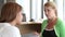 Woman Talking To Female Counsellor In Office