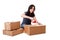 Woman taping moving storage boxes