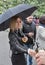 Woman taste wine during Kyiv Food and Wine Festival, Ukraine.