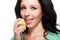 Woman tasting lemon