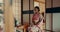 Woman, tea ceremony and Japanese traditional in tatami room for religious culture, respect or ritual. Asian person