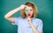 Woman teacher performing experiment with bulb and liquid. Girl observing chemical reaction chalkboard background