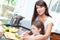 Woman teaching daughter kitchen safety