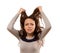 Woman tearing at her hair in desperation