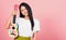 Woman teen confident smiling face hold acoustic Ukulele guitar