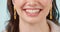 Woman, teeth and healthy smile closeup with cosmetics, dental hygiene and veneers in studio. Dentist work, female person