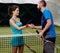 Woman tennis player and her coach