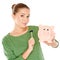 Woman testing her piggy bank with a mallet