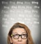 Woman with thoughtful expression, blog words above head