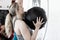Woman Throwing Medicine Ball In Gym