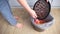 A woman throws a burnt pie in the trash