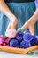 Woman tieing bouquet of hyacinth flowers. Life style photo. Copy